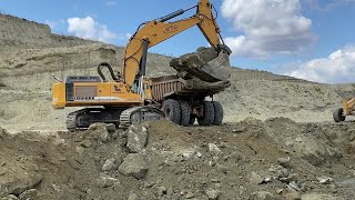 Liebherr 974 Excavator amp Caterpillar 325B Loading Caterpillar 773 Dumper  Sotiriadis  Labrianidis [upl. by Carrel]