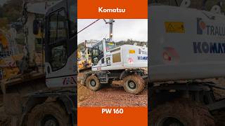 Komatsu PW160 digging railway ballast [upl. by Eirahcaz]