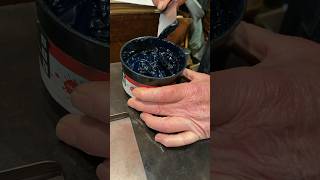 Rolling out green rubber base ink with a brayer on a galley tray for letterpress printing [upl. by Wieren]