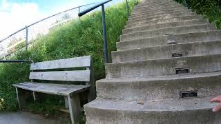 Respite Climbing Pine Mountain Ski Jump Stairs to reach a Bench Iron Mountain Michigan GX011937 [upl. by Janel]