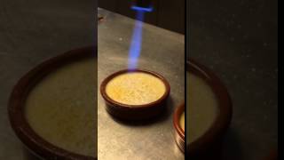 Caramelizing sugar on Crema Catalana at Cook amp Taste in Barcelona [upl. by Meter972]