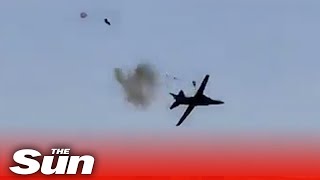 Moment pilot ejects from plane in horror crash at Michigan air show [upl. by Ylebmik]