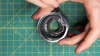 Olympus OMSystem FZuiko AutoS 50mm f18 Lens Disassembly [upl. by Nadirehs]