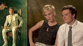 Catching Fire Cast React to Portraits [upl. by Ahsiekel608]