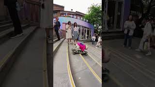 Dog skateboarding down the stairs on the pedestrian street the rate of turning heads is 100 p [upl. by Bezanson]