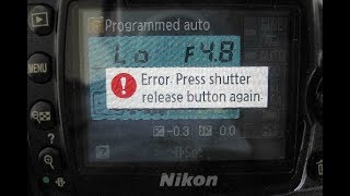 How to fix Nikon Error Press Shutter Release Button Again DSLR [upl. by Eahsal]