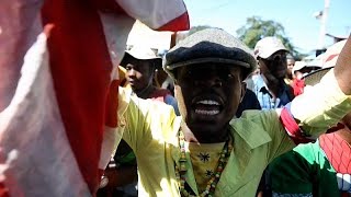 Haitian police fire tear gas on hundreds of protesters [upl. by O'Brien209]