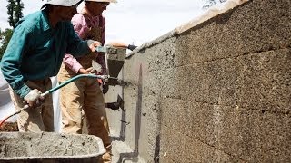 FasWall Sustainable Home Construction With A Mortar Sprayer and HERBCRETE Stucco Core MIx [upl. by Aremahs]