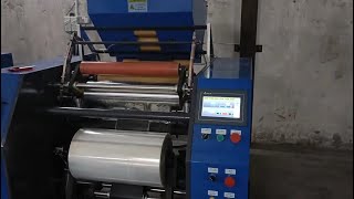 Full automatic jumbo roll rewinding machineHigh speed pe pvc plastic stretch film rewinding machine [upl. by Casper]