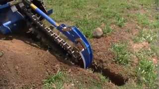 Auger Torque MT900 Trencher on Kubota SVL75 [upl. by Kirre]