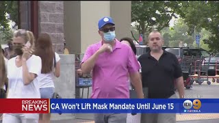 California To Keep Mask Mandate Through June 15 [upl. by Nahgeam]