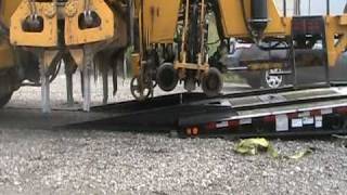 TRAILEZE Trailers TE100FGRR loading Jackson 6700 Tamper [upl. by Ilatfen520]