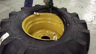 KenTool How to Properly Use Bead Holders 31710 on a 21L24 Backhoe Tire and Wheel [upl. by Chilson]