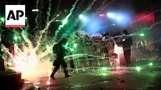 Georgian protesters clash with police for a second night after EU talks are suspended [upl. by Warfeld]