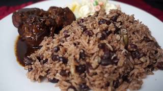 HOW TO COOK JAMAICAN RICE AND PEAS WITH HOMEMADE COCONUT MILK [upl. by Aisyram]