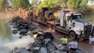 Road trains at Cahills crossing on East Alligator river Kakadu National Park Australia [upl. by Vidovik644]