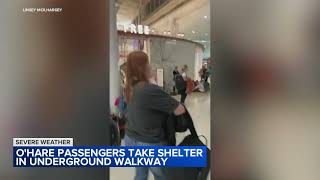 OHare Airport passengers take shelter in underground walkways during storm warnings [upl. by Ellehsad126]