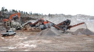 Hitachi Zaxis 670 LCH  Komatsu WA5006  Nordberg amp Sandvik Crushers  work in a quarry [upl. by Sabanrab]