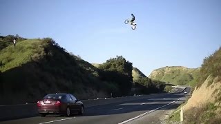 Kyle Katsandris jumps motorbike across freeway [upl. by Ahsoem]