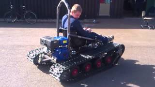 Home made tracked vehicle First test Drive [upl. by Enirahtak659]