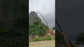 Mountain demolition excavator lifting work [upl. by Boothman762]