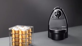 Nespresso Essenza How To  Cup Size Programming [upl. by Hsiekal]