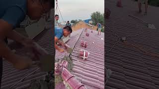 The laying process of red glazed roof tiles in farmhouse [upl. by Htinnek]