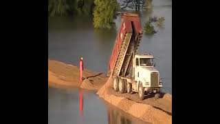 Road construction in water [upl. by Stanfield]