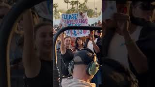 Emma Chamberlain holding a quotPlease play Espressoquot sign during Sabrina Carpenters Coachella set W2 [upl. by Gauntlett]