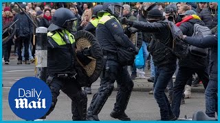 Protests in Europe Police in Amsterdam clash with antilockdown protesters [upl. by Farhsa]