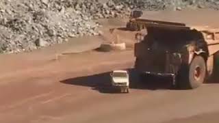 Dump Truck crushes decrepit ute in Kalgoorlie [upl. by Idoux442]