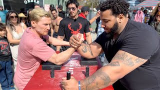 Pro Arm Wrestler challenges people in public [upl. by Esiuol]