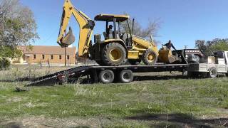 How To Load A Backhoe [upl. by Alurta]