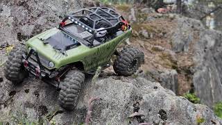 Testing out the new Injora Swamp Stompers on the slick rocks  SCX24 Deadbolt [upl. by Nicram]