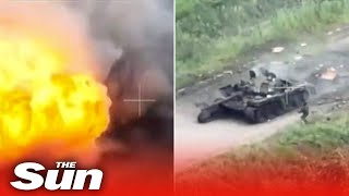 Russian tank EXPLODES in a ball of flame as Ukrainian forces strike [upl. by Ymrej179]