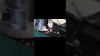 Electric motor stator manufacturing stator coil strapping process [upl. by Suirauqram502]