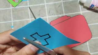 Instructions for cutting and pasting a first aid kit extremely easily from colored paper at home [upl. by Hguh]