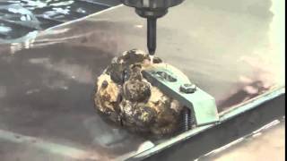 Flow Waterjet Cutting A Geode [upl. by Etezzil649]