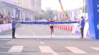 GLOBALink  Ethiopian runners win at Xiamen Marathon [upl. by Asha944]