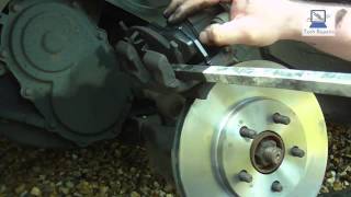 How to Replace the front Brake pads and discs on a Chrysler Neon 20 94 to 2012 [upl. by Dira]