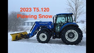 Plowing Snow with New Holland T5120 [upl. by Legnaros]