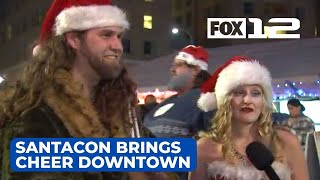 Portlanders fill downtown with Christmas cheer for SantaCon [upl. by Aniale]