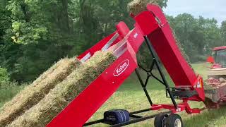 Bailing hay with 10 bale kuhns accumulator [upl. by Corty]