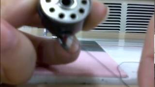 How to Thread the Bottom Portion of Your Janome Bobbin [upl. by Etnelav]