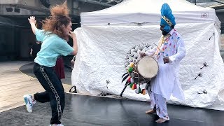 Freestyle Dancing to the Dhol Beat of Ustaad Ravi Kumar Ji  Vancouvers Robson Square [upl. by Zelde]