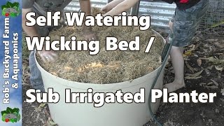 How to Make a Self Watering Wicking Bed  Sub Irrigated Planter  Stock Tank Build [upl. by Eiralam]