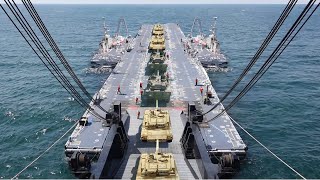 How US Transfers Tons of Military Hardware in Middle of the Ocean [upl. by Llekram]