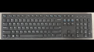 How to change the battery  Dell WK636P  KM636 Wireless Keyboard [upl. by Catlaina]