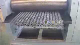 Expanded metal mesh flattening machine [upl. by Ardnalahs]