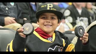 Little Penguins Fan Rewarded After Adult Steals Puck [upl. by Willette]